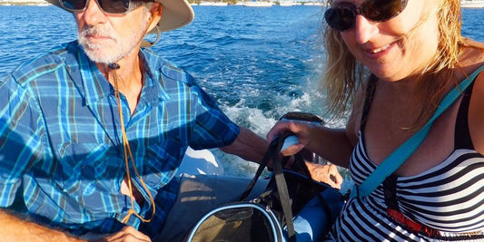 veterinarian issuing health certificate to pet with travel accessories